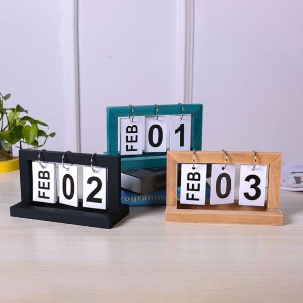 Wooden calendars showing February 1st, 2nd, and 3rd. Eco-friendly flip calendars, wholesale available.