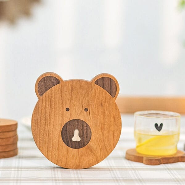 Cute bear-shaped wooden coasters. Set of adorable animal coasters for drinks.