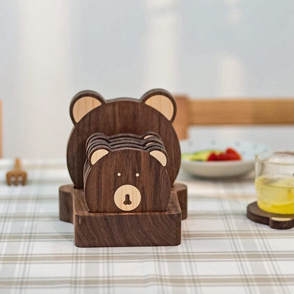 Cute bear-shaped walnut wooden coaster set. Perfect for adding charm to your home decor.