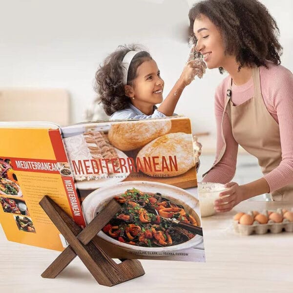 Wooden cookbook stand displaying a Mediterranean cookbook. Perfect for kitchens & reading. Durable wood display rack.