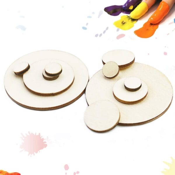 Round wooden discs for crafts on a colorful painted background