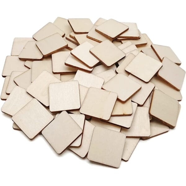 Pile of unfinished square wooden craft blanks.