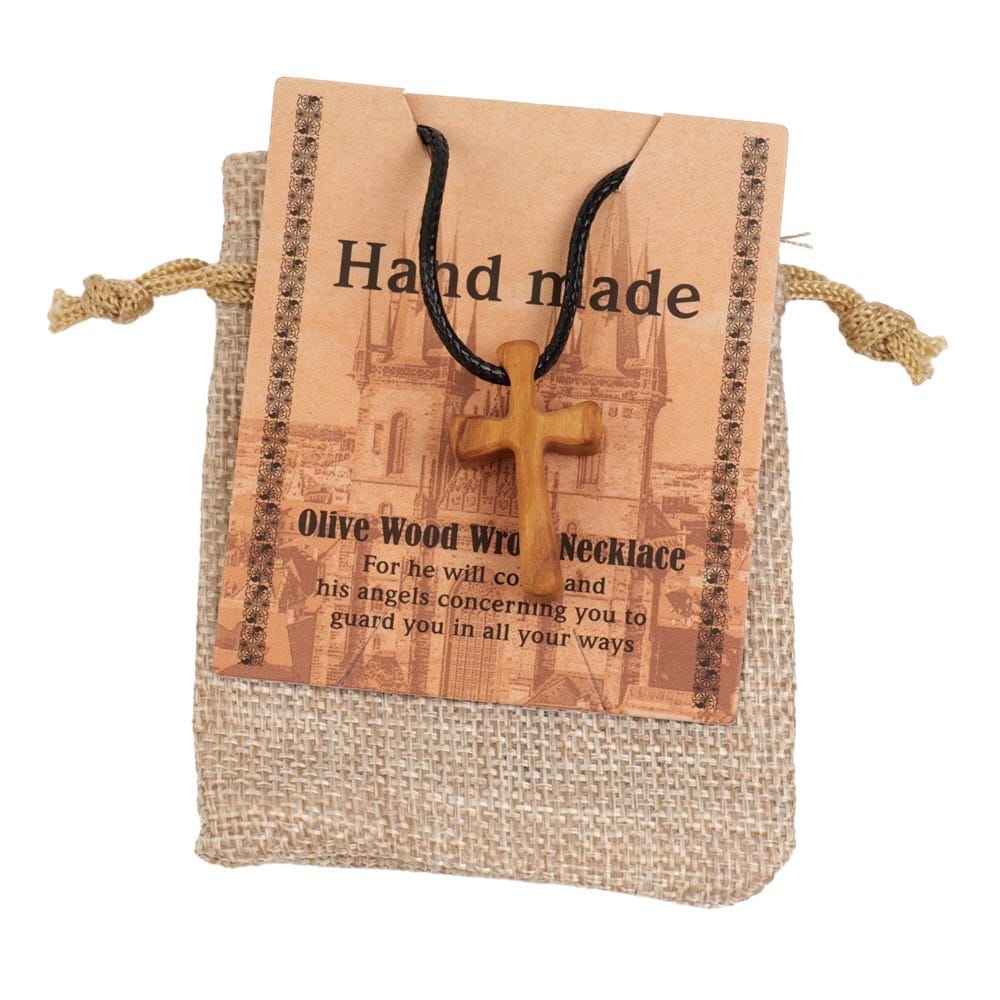 Handmade olive wood cross necklace with black cord, presented in a burlap gift bag. Christian jewelry.