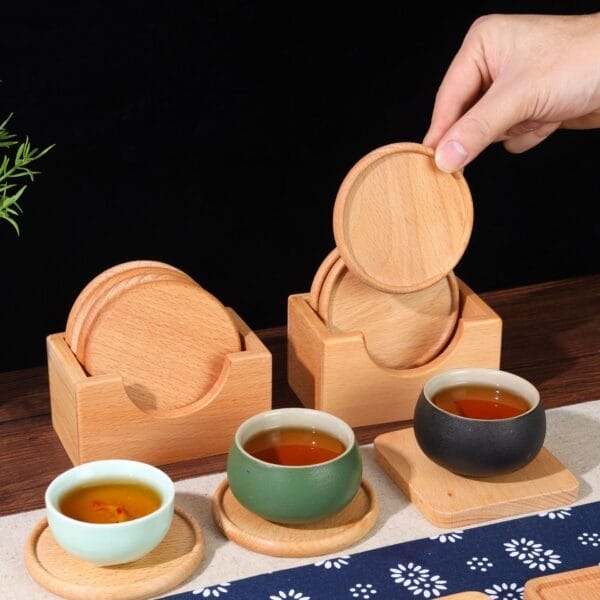 Set of round wooden coasters in a holder, ideal for teacups. Wholesale bamboo coasters available.