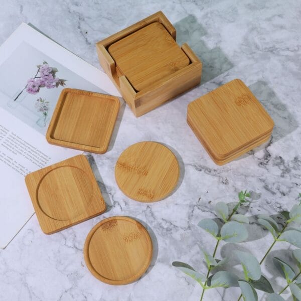 Set of round and square bamboo coasters, some in a wooden holder. Wholesale bamboo coasters for heat insulation.
