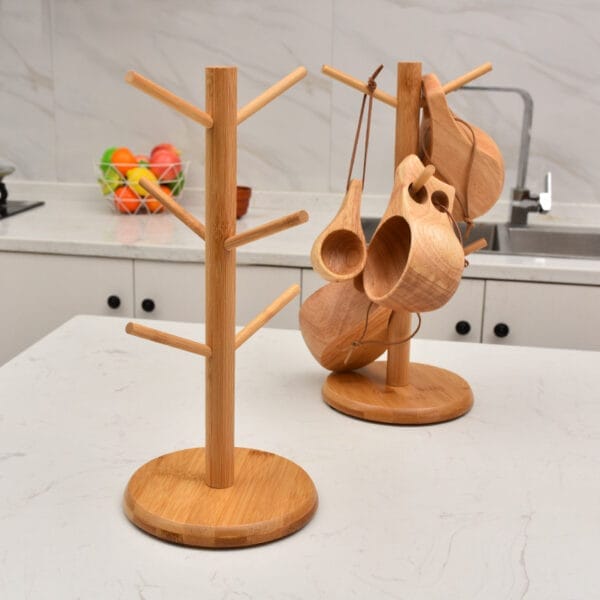 Bamboo wooden cup & mug tree racks. One holds several wooden mugs; the other is empty. Custom logo options available.