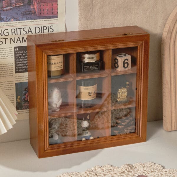 Wooden Display Box: 9-compartment curio cabinet for collectibles, showcasing small items and beauty products. Perfect for organizing and displaying treasured possessions.