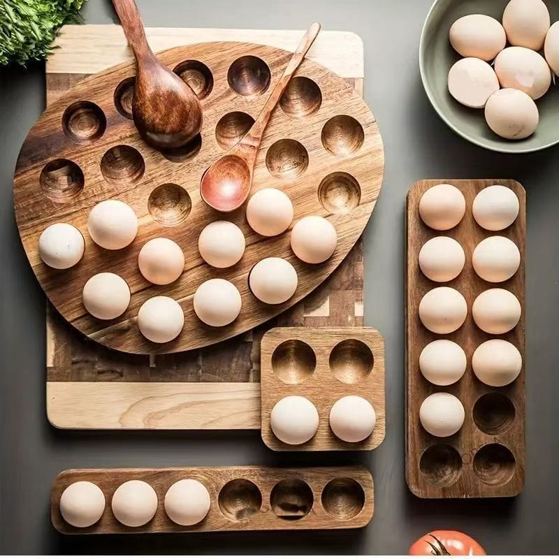 Eco-friendly wooden egg holders: Set of various sizes, perfect for kitchen egg storage and organization.