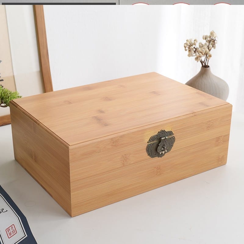 Handcrafted bamboo wooden gift box with ornate metal clasp; perfect for storage or gifting.