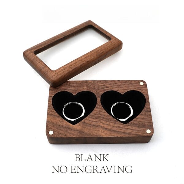 Walnut double ring box with heart-shaped compartments, perfect for wedding rings. Features a separate lid for display.