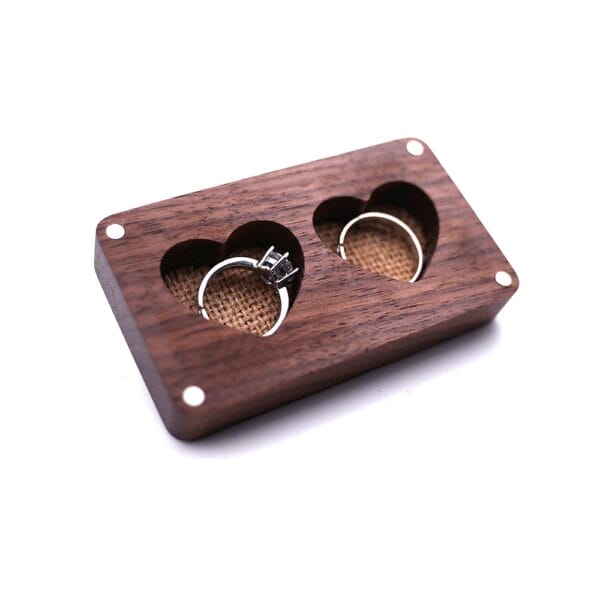 Walnut ring box with two heart-shaped compartments for wedding or engagement rings. Perfect wooden ring holder for jewelry.
