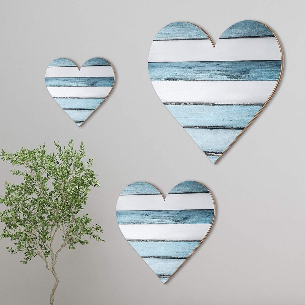 Three rustic blue and white striped heart-shaped wooden love sign