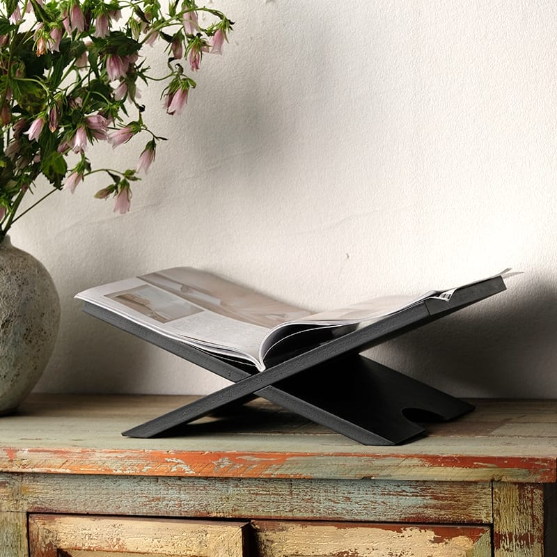 Black wooden magazine holder, a stylish wood reading rack & book stand perfect for displaying books or magazines.