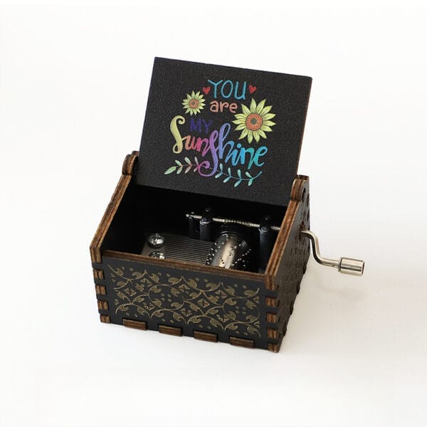 Vintage Hand-Crank Wooden Music Box with "You are my Sunshine" engraving.