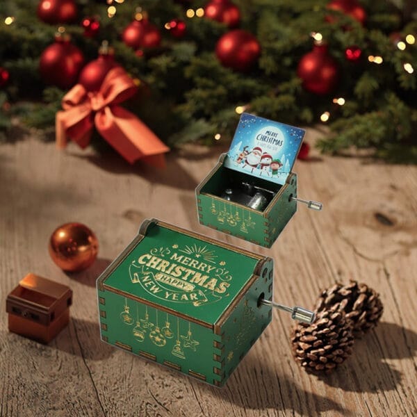 Vintage Hand-Crank Wooden Music Box: Green wooden music box with Merry Christmas and Happy New Year engravings, playing a festive tune.