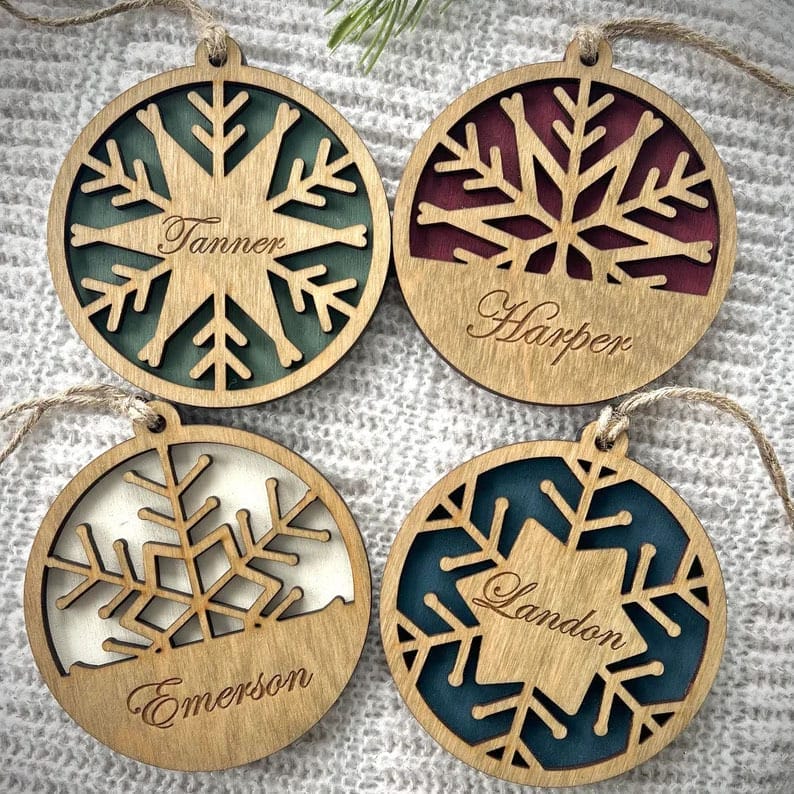 Four personalized wooden name sign for nursery ornaments with names Tanner, Harper, Emerson, and Landon. Wholesale nursery decor.