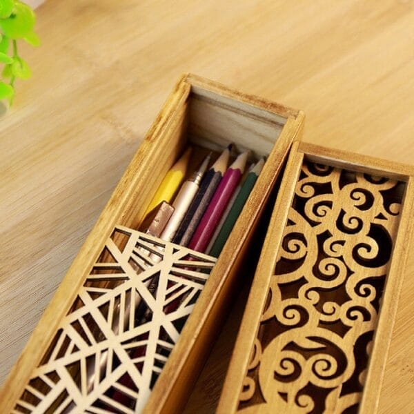 Custom Vintage Wooden Pencil Box: Handcrafted wooden pencil case with geometric & swirling designs, holding colored pencils & pens.