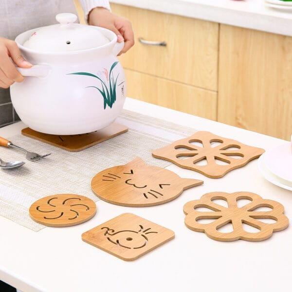 Cute laser-cut wooden personalized coasters: Cat, flower, and swirl designs. Perfect for home decor.