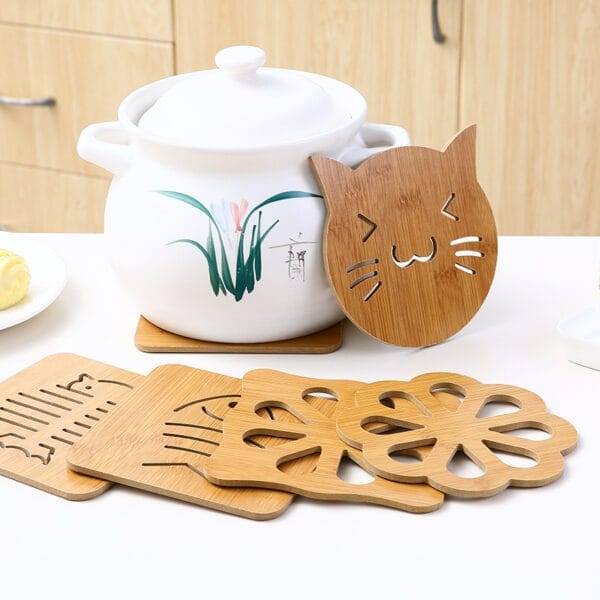 Wholesale bamboo coasters: Set of custom wooden coasters with cat, fish & flower designs. Perfect for home or cafe.