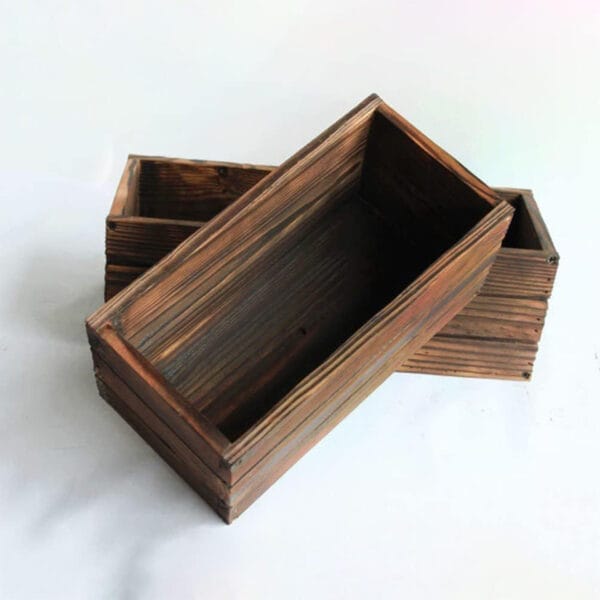 Rustic brown wooden planter boxes, perfect for wholesale or custom orders.