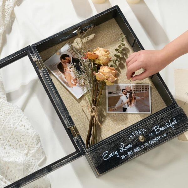Custom Wooden Shadow Box: Black keepsake box with glass front, burlap interior, displaying wedding photos & dried flowers. Perfect for wholesale & branding.
