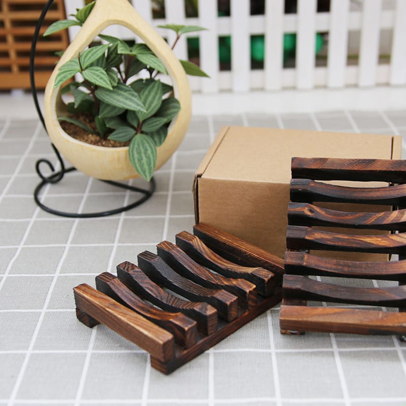 Dark brown wooden soap holder, perfect for bathroom. Wholesale available.
