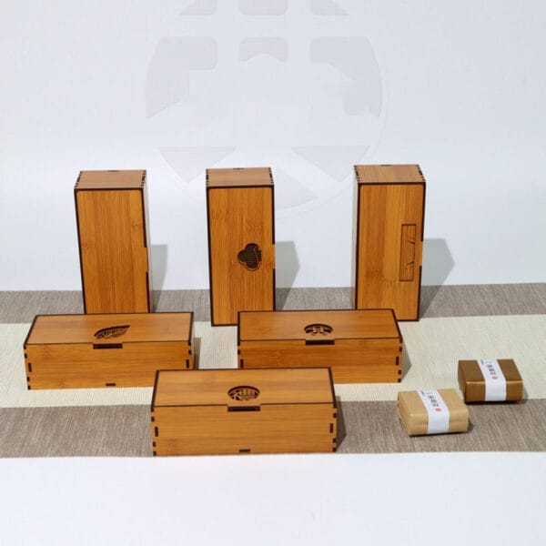 Wholesale Bamboo Wooden Tea Boxes: Set of custom laser-cut tea storage boxes in various sizes, perfect for tea storage and gifting.