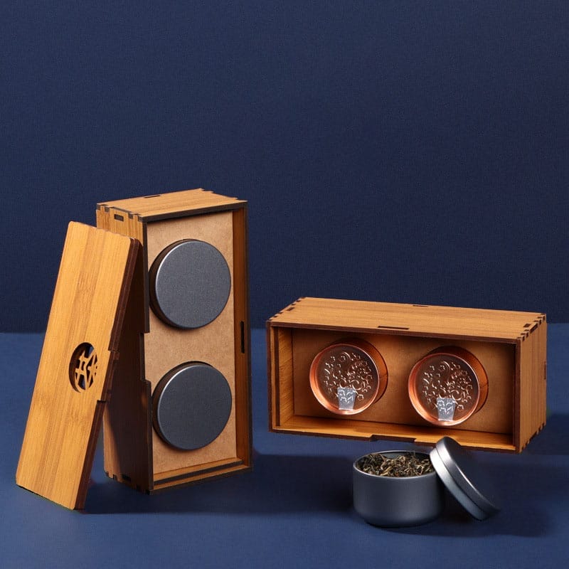 Bamboo wooden tea box set: Wholesale custom wood box with two compartments for tea storage, featuring dark gray and copper tea tins.