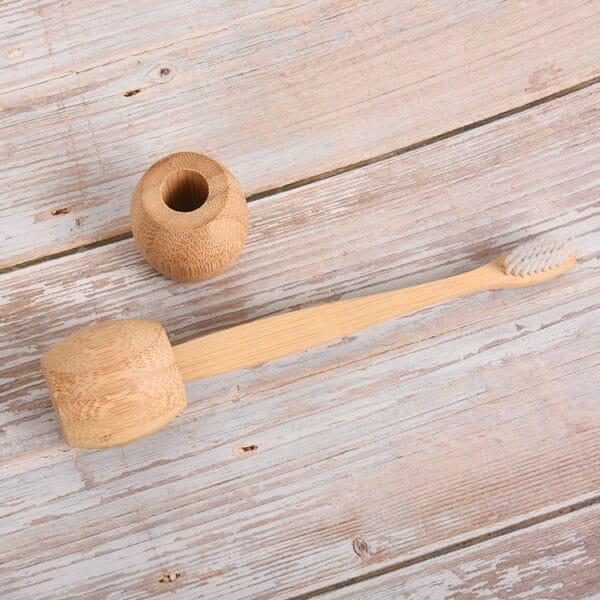 Bamboo toothbrush and holder set: Eco-friendly wooden toothbrush stand and matching holder for bathroom use. Perfect for hotels.