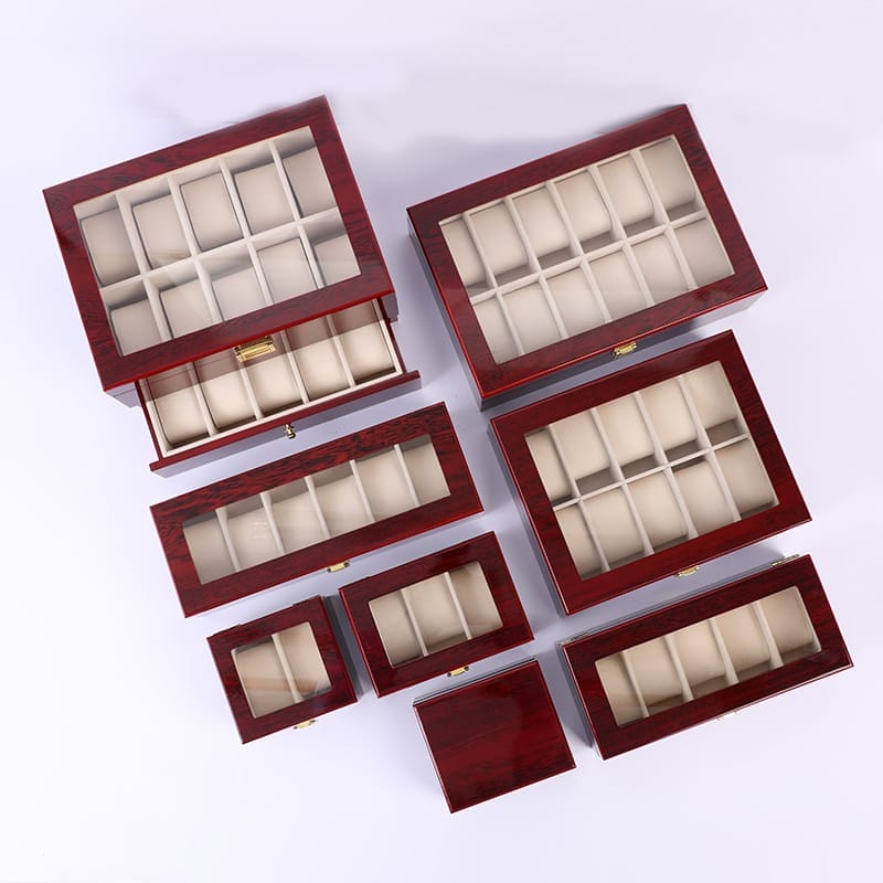 Custom Wooden Watch Box: Wholesale lot of various sized wooden watch boxes with glass tops, perfect for watch storage and display.