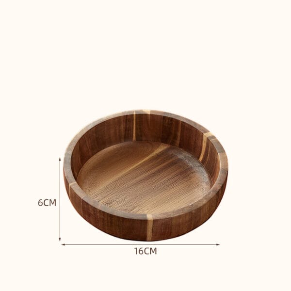 Acacia wood salad bowl, 16cm diameter and 6cm high. Perfect for serving or as a decorative piece. Wholesale options available.
