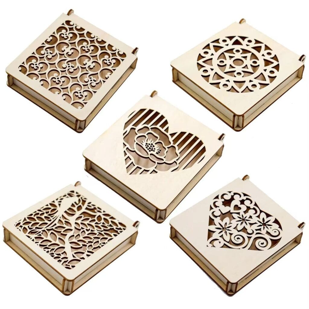 Custom Carved Wooden Boxes: Set of 5 laser-cut wooden boxes with intricate floral, heart, and geometric designs. Wholesale available.