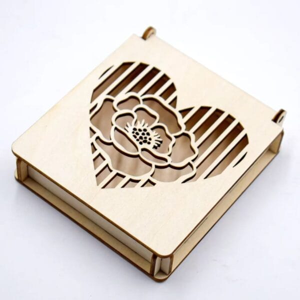 Custom Carved Wooden Box: Laser-cut wooden box with a heart-shaped design featuring an intricate flower. Wholesale available.