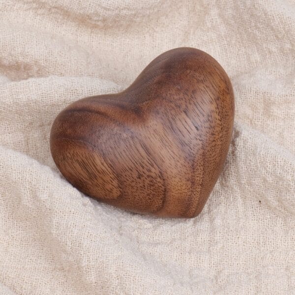 Solid Black Walnut Carved Wooden Heart: Hand-carved from solid black walnut, this custom-made wooden heart is a unique and beautiful keepsake.