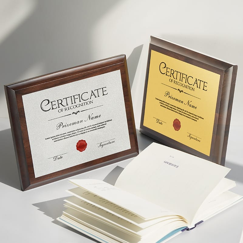 Custom Engraved Wooden Plaque: Elegant engraved certificates in gold and silver, displayed on a wooden plaque. Perfect corporate recognition awards or gifts.
