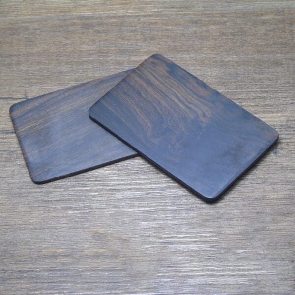 Custom Laser Cut Wooden Business Card Holders: Wholesale supplier of elegant, laser-cut wooden business card holders with rich wood grain.