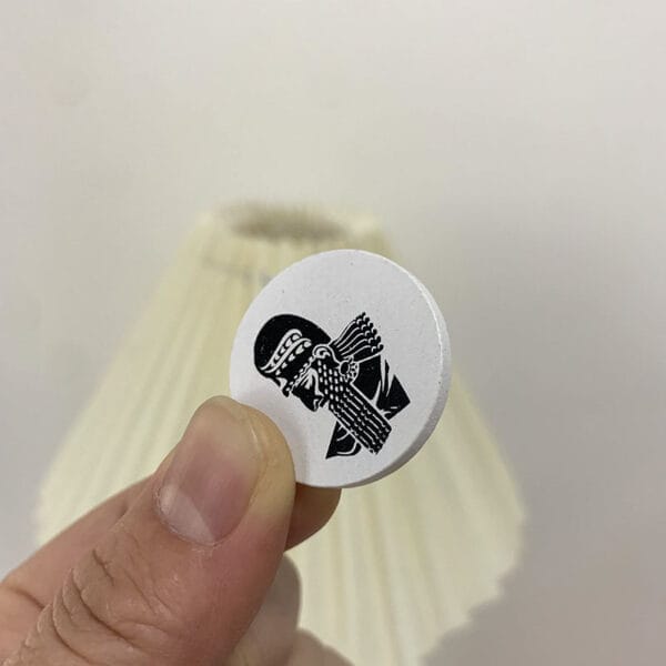 Custom Personalized Wooden Coin: White wooden coin featuring a black and white design, perfect for wholesale orders.