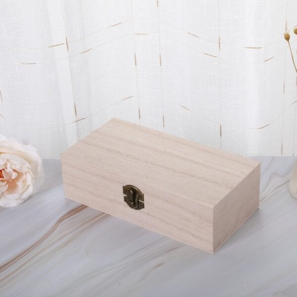 Custom Wood Vintage Rectangular Storage Box: Light-colored wooden storage box with a bronze latch. Perfect for organizing and storing small items.