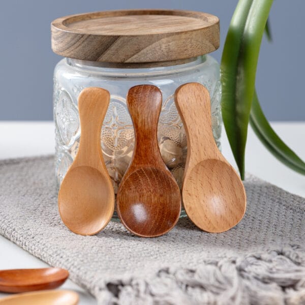 Wholesale mini wooden spoons: Set of three custom hardwood spoons in light, medium, and dark wood tones.