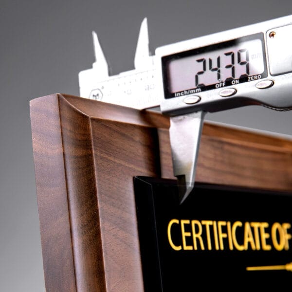 Black Walnut Wooden Plaque: Custom award plaque with dark wood frame and black insert, showcasing precise craftsmanship.