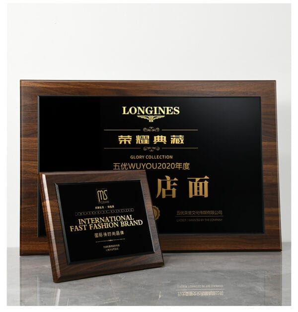 Custom engraved wooden plaques: Set of three black walnut awards featuring gold lettering, ideal for corporate recognition or employee awards.