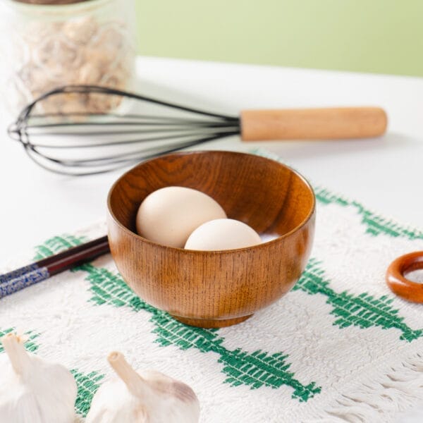 Manufacturer Wholesale Wood Heat-Resistant Wooden Bowl: Rustic wooden bowl, perfect for cooking or serving, holds two eggs. Heat-resistant kitchenware.