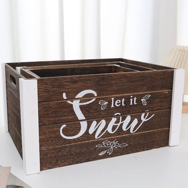 Rustic wooden box for decorating: Set of three, largest box features "Let it Snow" lettering. Perfect for holiday decor.