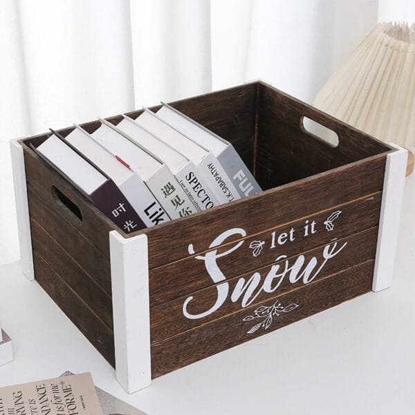 Rustic Christmas wooden box, perfect for storage or decor. Features "Let it Snow" lettering and ample space for books or ornaments.