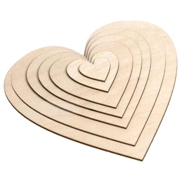 Layered wooden hearts: Set of nested wood heart shapes, perfect for crafts, Valentine's Day decor, and DIY projects.