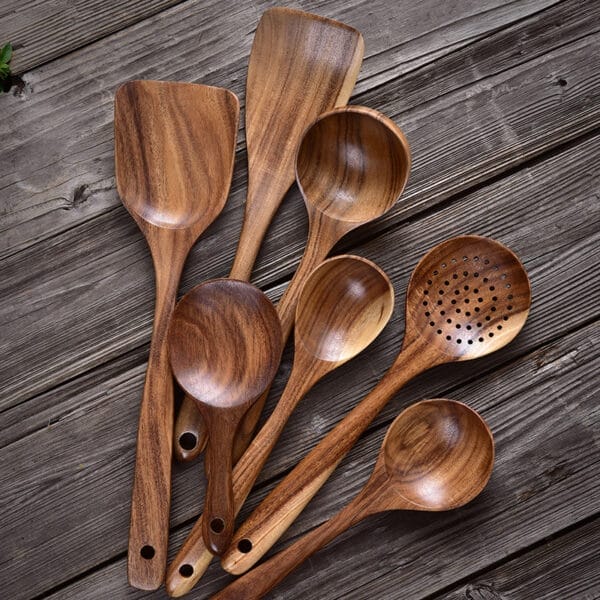 Set of handcrafted teak wooden cooking spoons and spatulas. Perfect for wholesale.