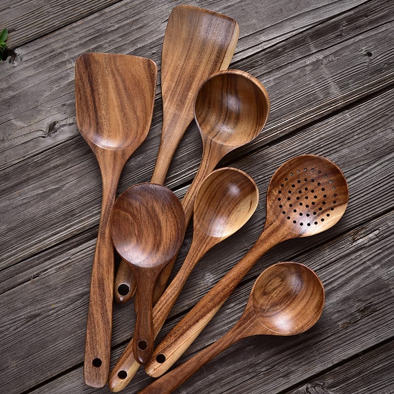 Set of handcrafted teak wooden cooking spoons and spatulas. Perfect for wholesale.