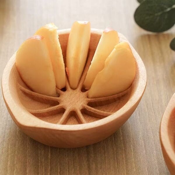 Custom beech wood fruit bowl, perfect for serving sliced apples or other fruits. Wholesale available.