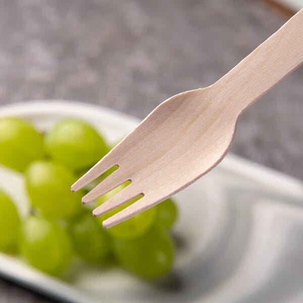 Eco-friendly disposable wooden fork, part of a wholesale custom wooden cutlery set. Biodegradable and perfect for events.