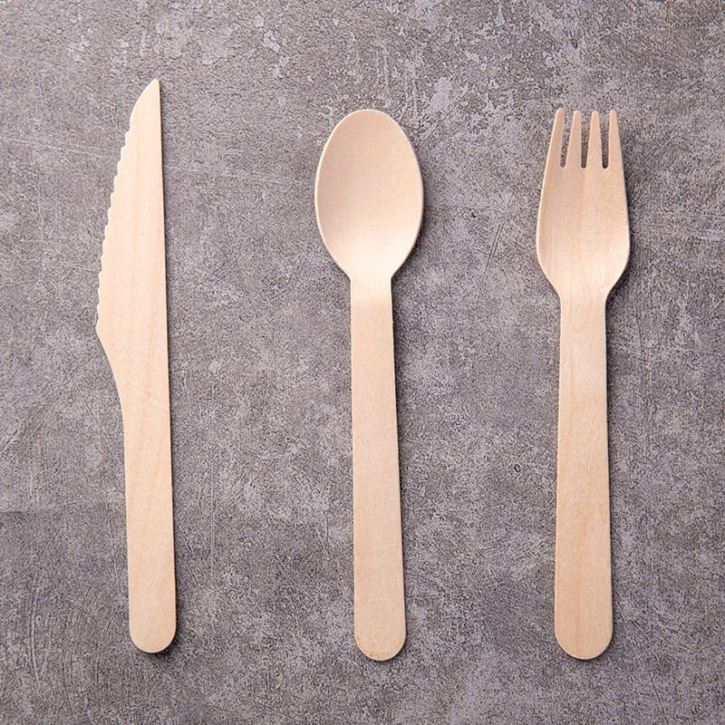 Eco-friendly wooden cutlery set: knife, spoon, and fork. Wholesale biodegradable disposable option.